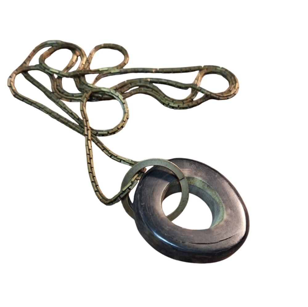 Modernist Carved Wheel Shaped Pendant on Long Chain Art Teacher Vibes